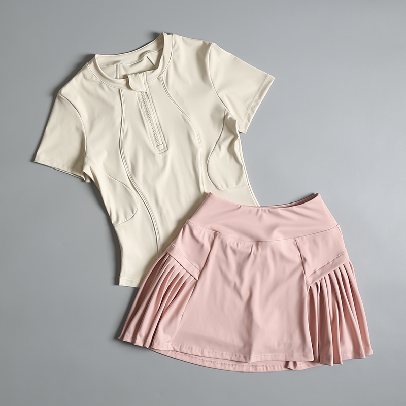 Running sports suit for women  - مراجعة Badminton Junior وسعره